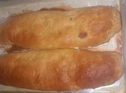 Una foto de pan de aceitunas