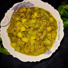 A picture of Turai aloo posto sabzi(Ridge gourd potato curry with poppy seeds.