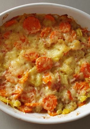 Une photo de Gratin de patisson, pommes de terre, carottes