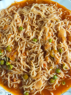 A picture of Veggie loaded masala Maggi 😋😋.