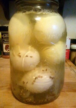 A picture of Amish Yellow Pickled Eggs.