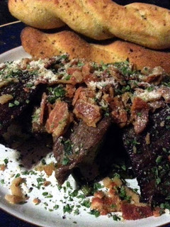 A picture of Steak and Spring Herbs.