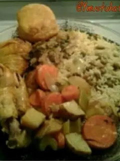 A picture of YMUSTUHATE my Jamaican curry chicken with rice & peas.