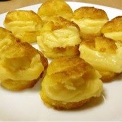 A picture of Cream Puffs in a Toaster Oven.