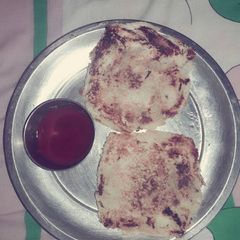 A picture of Bread aaloo ke stuffed paranthe.