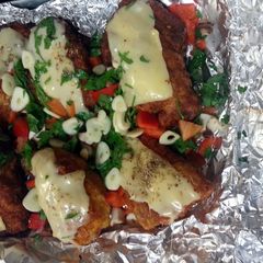 A picture of Fried chicken with herbs.