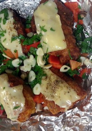 A picture of Fried chicken with herbs.