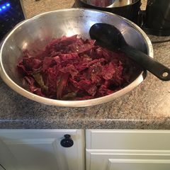 A picture of Red cabbage and apples.