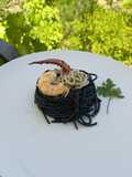 Spaghetti Nero di seppia al fruto di mare