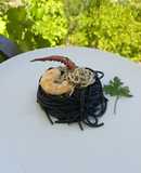 Spaghetti Nero di seppia al fruto di mare