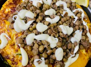 Una foto de TORTILLA DE ZAPALLO CALABAZA Y ZAPALLITOS (con topping de lentejas)