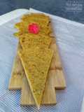Fainá tradicional con parmesano