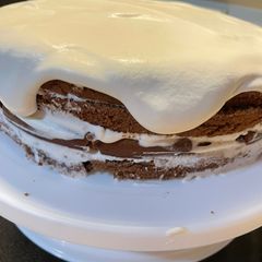 A picture of Chocolate whipped cream cake.