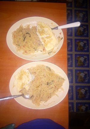 A picture of Spaghetti,fried egg😊.
