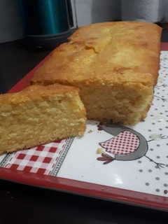 Una foto de Budín de naranja con glasé de naranja