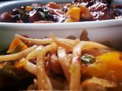 A picture of stir fried chicken and leafy greens