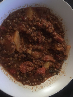 Una foto de Lentejas con chorizo y panceta oreada