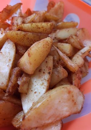 Una foto de Papas en gajo
