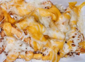 Foto de Batata frita com Cheddar