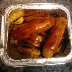 A picture of Sausage & chips & gravy.