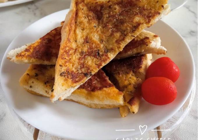 Bagaimana Menyiapkan Garlic Cheese Toast yang Bikin Ngiler
