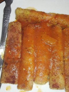Una foto de Rollitos de jamón y queso