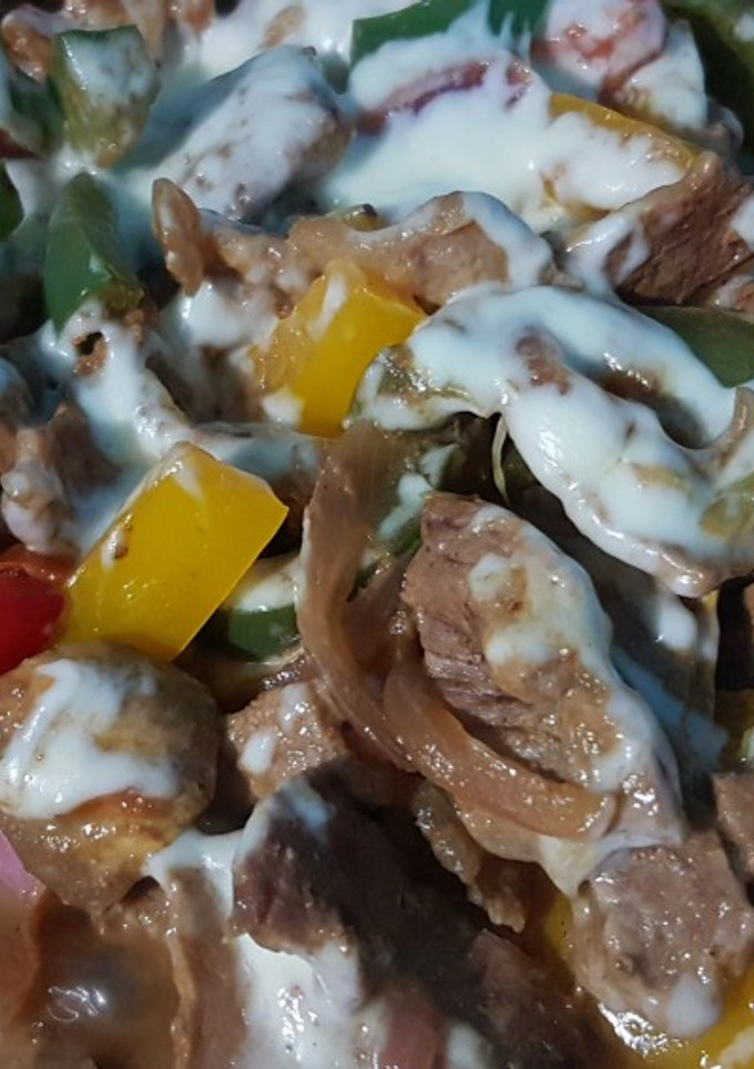 Una foto de Fajitas de res con queso