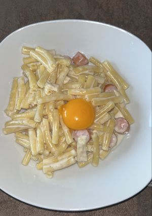 Une photo de Pâtes macaronis aux saucisses et fromage de chèvre