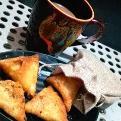 A picture of One bite samosa.