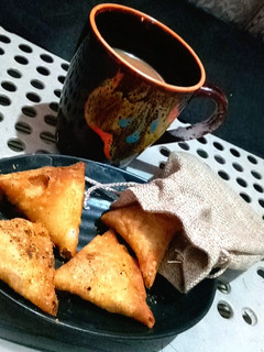A picture of One bite samosa.