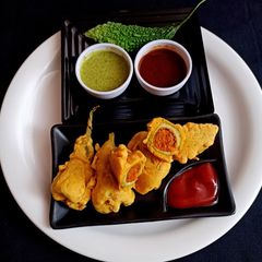A picture of Stuffed bitter gourd na pakoda.