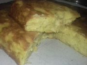 Una foto de tarta de choclo y verdura