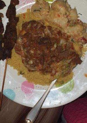 A picture of Curried cous cous and veg sauce.