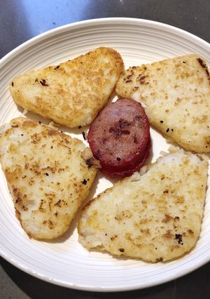 A picture of Crispy Hashbrowns with Sausage.