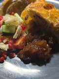 Wild boar sausage rolls with truffle oil and christmas slaw