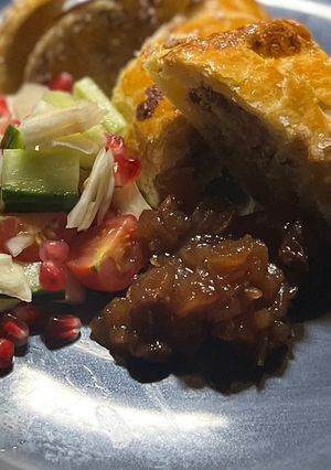 A picture of Wild boar sausage rolls with truffle oil and christmas slaw.