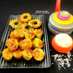 A picture of Rice Flour Green Garlic Khichu Gujarati Cuisine - Papdi No Lot - Chokha Na Lot Nu khichu.
