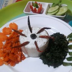 A picture of Carrot pickle Curd rice Greens fry.