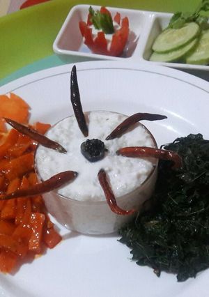 A picture of Carrot pickle Curd rice Greens fry.