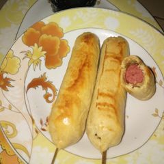 A picture of Baked corn dogs.