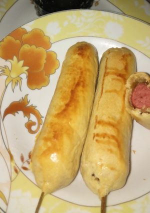 A picture of Baked corn dogs.