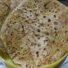 A picture of Mooli Ke Parathe(Spiced Raddish Stuffed Flat Bread).