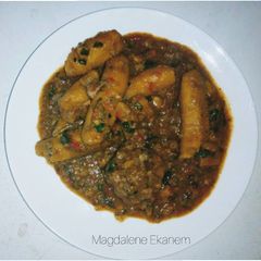 A picture of Unripe plantain porridge with goat meat 🖤.