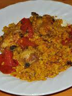 Una foto de Paella