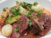 A picture of beef stew mushrooms and carrots