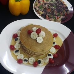 A picture of Eggless banana pancake & spinach omelette.