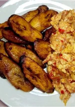 A picture of Fried egg and fried plantain.