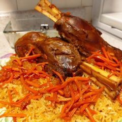 A picture of Lamb Shank Afghani Pulao.