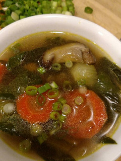 A picture of Shiitake mushroom and bok choy soup.