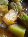 Potatoes, pumpkin and pointed gourd curry